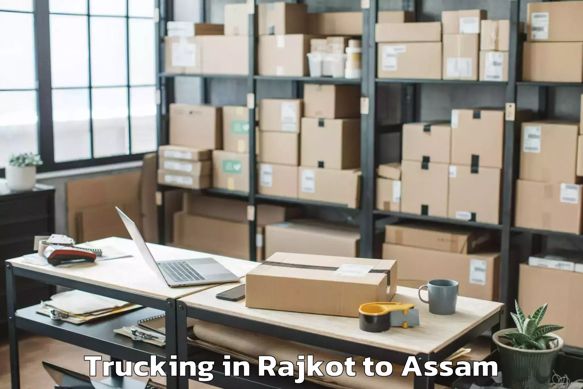 Easy Rajkot to Silapathar Trucking Booking